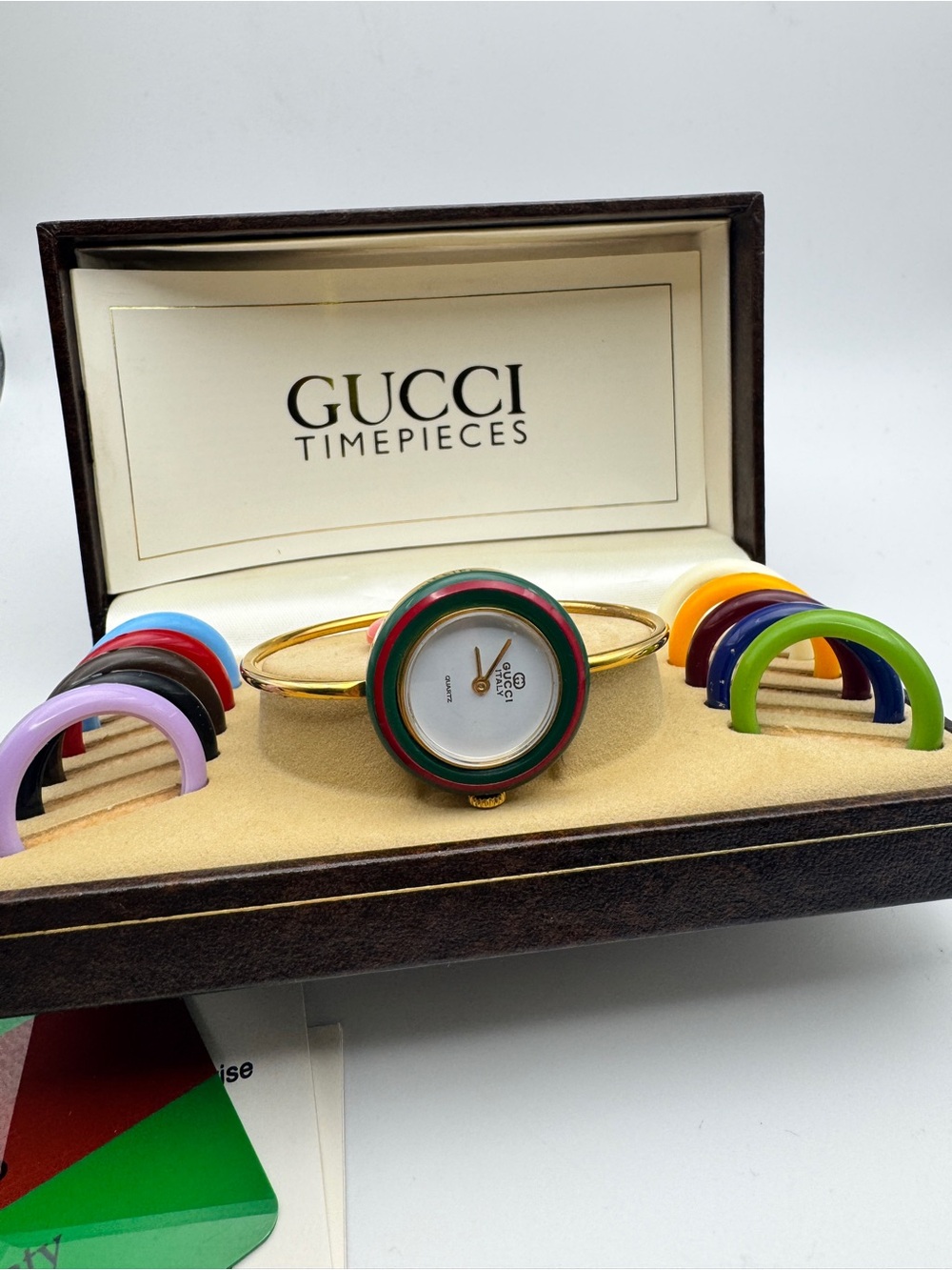 Vintage GUCCI Women's Gold Bangle Watch with Interchangeable Bezels